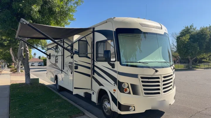 The RV with the awning out